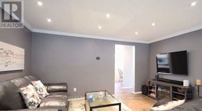 Cambridge apartment for rent - A living room with a couch, a television, and a coffee table.
