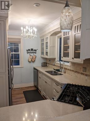 Hamilton (Rosedale) apartment for rent - A kitchen with a chandelier hanging from the ceiling.