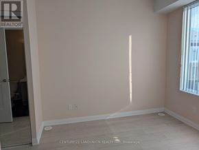 Vaughan (Concord) townhouse for rent - A room with a light colored wall and a window with blinds.
