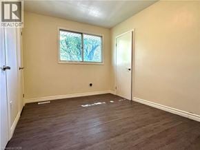 Kitchener apartment for rent - A room with a window and a door.