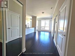 Mississauga (City Centre) condo for rent - A hallway with white doors and a light on the ceiling.