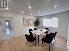 London South (South F) apartment for rent - A dining room with a white table and black chairs.