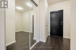 Mississauga (Hurontario) condo for rent - A room with a black door and a white wall.