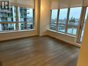 Vancouver apartment for rent - A room with a view of a snowy landscape outside the large windows.