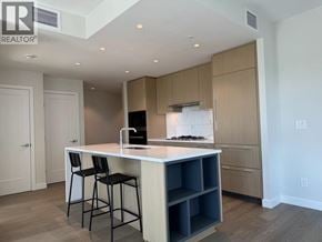 Vancouver apartment for rent - A modern kitchen with a bar stool and a countertop.