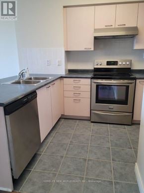 Markham (Commerce Valley) condo for rent - A kitchen with a stove, oven, dishwasher, and sink.