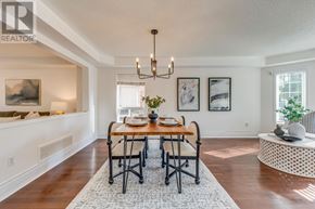 Burlington (Orchard) apartment for rent - A dining room with a wooden table and chairs.