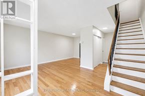 Mississauga (Applewood) townhouse for rent - A room with a staircase and a white wall.
