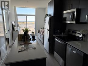 Hamilton condo for rent - A modern kitchen with a view of the beach.