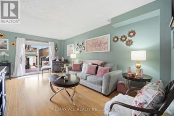 Brampton (Heart Lake West) apartment for rent - A living room with a grey couch and a coffee table.