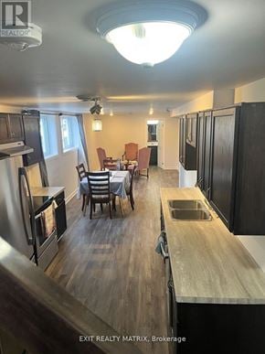 Ottawa apartment for rent - A kitchen with a table and chairs in the middle of the room.