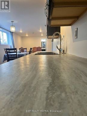 Ottawa apartment for rent - A dining room with a table and chairs is shown in the image.