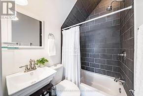 Whitchurch-Stouffville (Stouffville) apartment for rent - A bathroom with a white sink and a white towel.