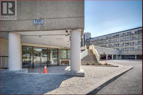 Toronto (Malvern) condo for rent - The image shows a building entrance with a sign that reads "REALTOR" and the number "5580".