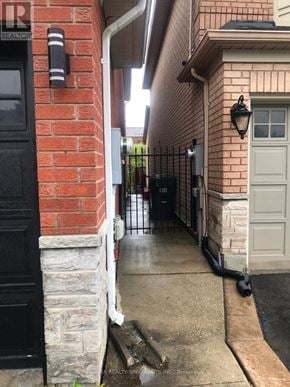 Mississauga (Lisgar) apartment for rent - A black door is on the left and a white door is on the right.