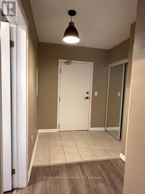 Brampton (Northwest Brampton) condo for rent - A room with a white door and a brown floor.