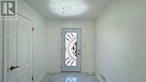 Kitchener apartment for rent - A white door with a window in the middle of it.