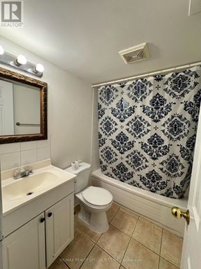 Mississauga (Churchill Meadows) townhouse for rent - A bathroom with a toilet, sink, and shower.