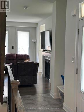 Brampton (Northwest Brampton) apartment for rent - A living room with a couch and a television.