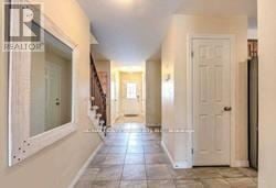 London South (South U) apartment for rent - A hallway with a white door at the end.