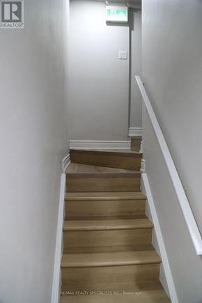 Mississauga (Churchill Meadows) apartment for rent - A staircase with a white railing and beige steps.