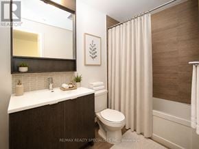 Mississauga (Central Erin Mills) condo for rent - A bathroom with a toilet, sink, and shower.