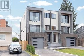 Mississauga (Lakeview) apartment for rent - A modern two-story house with a car parked in front.