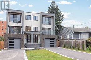 Mississauga (Lakeview) apartment for rent - A modern two-story house with a garage is for sale.