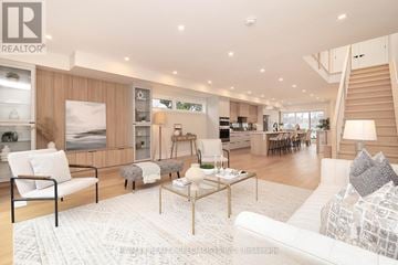 Mississauga (Lakeview) apartment for rent - A living room with a white couch and a coffee table.