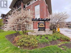 Guelph (Pineridge/Westminster Woods) condo for rent - A sign for a RE/MAX Realty Specialist in Rokersgate.