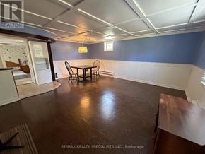 Mississauga (Clarkson) apartment for rent - A room with a table and chairs in the middle.