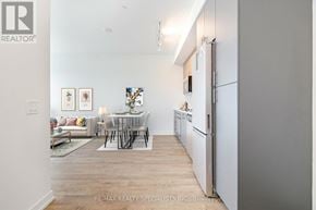Hamilton (Kirkendall) condo for rent - A modern kitchen with a dining table and chairs.