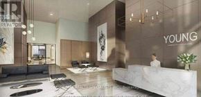 Kitchener condo for rent - A reception area with a woman standing behind the desk.