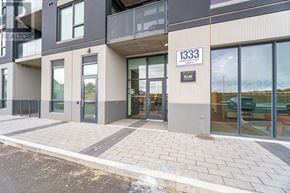 Kitchener condo for rent - The building number 1333 is shown in front of a modern building.
