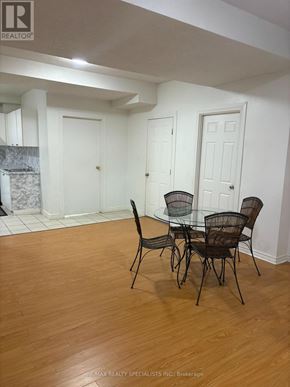 Mississauga (Meadowvale) apartment for rent - A dining room with a glass table and chairs.