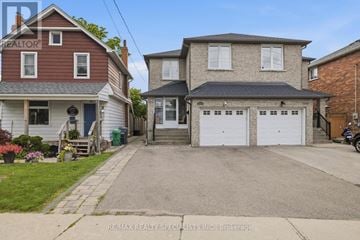 Mississauga (Lakeview) apartment for rent - A house with a red roof is shown in the image.