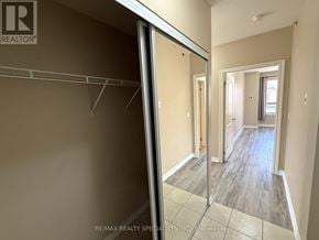 Mississauga (East Credit) condo for rent - A room with a sliding glass door leading to another room.