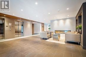 Milton (Fo Ford) condo for rent - A spacious living room with a fireplace and a couch.
