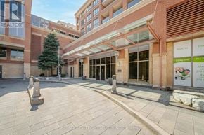Mississauga (City Centre) condo for rent - A building with a sign that says REALTOR in the window.