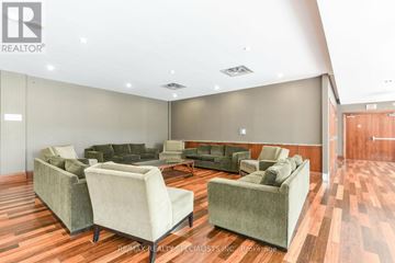 Mississauga (City Centre) condo for rent - A living room with a couch and chairs.