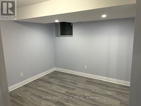 Brampton (Credit Valley) apartment for rent - A room with grey flooring and a window with blinds.