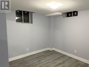 Brampton (Credit Valley) apartment for rent - A room with a grey floor and white walls.