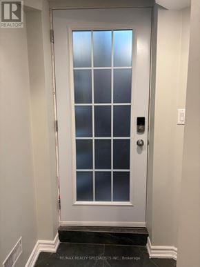 Mississauga (Meadowvale Village) apartment for rent - A white door with a glass panel and a handle.