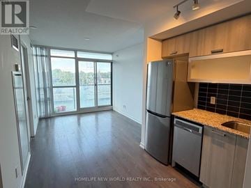 Toronto (Little Portugal) condo for rent - A kitchen with a refrigerator, dishwasher and a sink.