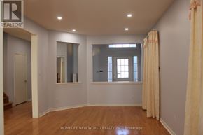 Markham (Berczy) apartment for rent - A room with a window and a door.