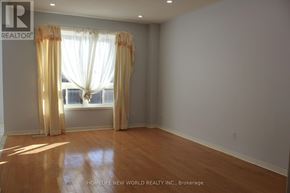 Markham (Berczy) apartment for rent - A room with a window and curtains, with the logo "R" and the text "HOMELIFE NEW WORLD REALTY INC., Brokerage" on the wall.