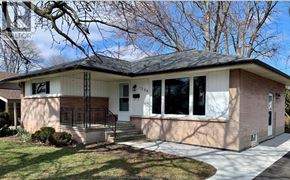 Windsor apartment for rent - A house with a front porch and a covered entrance.