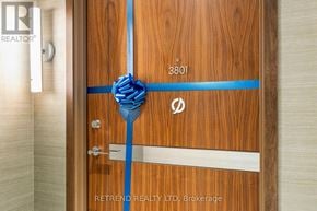 Toronto (Waterfront Communities) condo for rent - A door with a blue tape and a number 3801 on it.