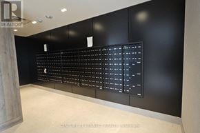 Oakville (Jm Joshua Meadows) condo for rent - A black board with white writing in a room.