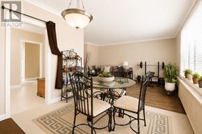 Toronto (Beechborough-Greenbrook) multi-family for rent - A dining room with a glass table and chairs.